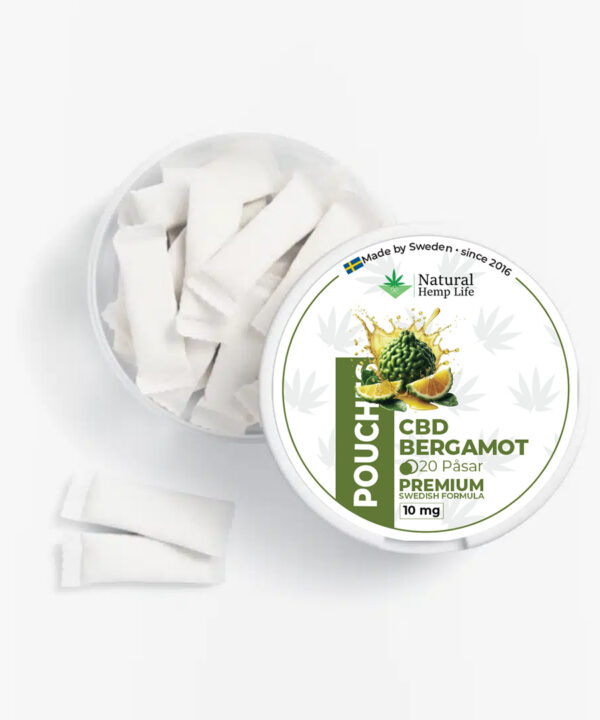 Ovenfra-billede af åben dåse med hvide CBD-pouches i bergamotsmag